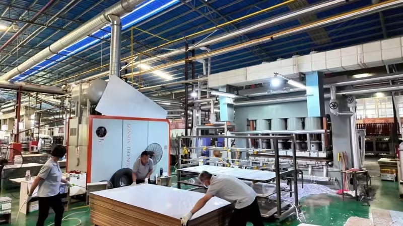 Melamine facing and board handling process at RichYield factory